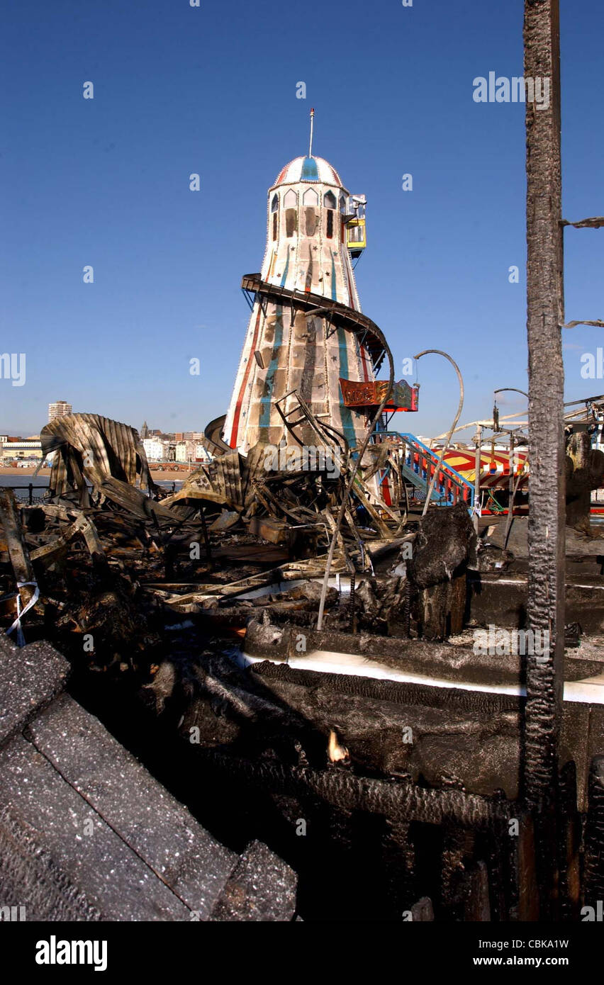 Fire damage to the Palace Pier (Brighton Pier) beside the helter skelter 2003 Stock Photo