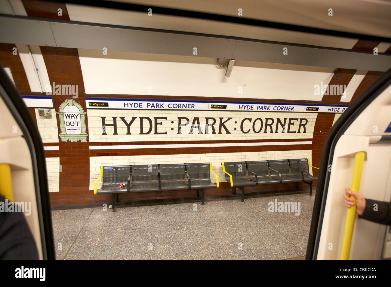 doors opening at hyde park corner london underground station england