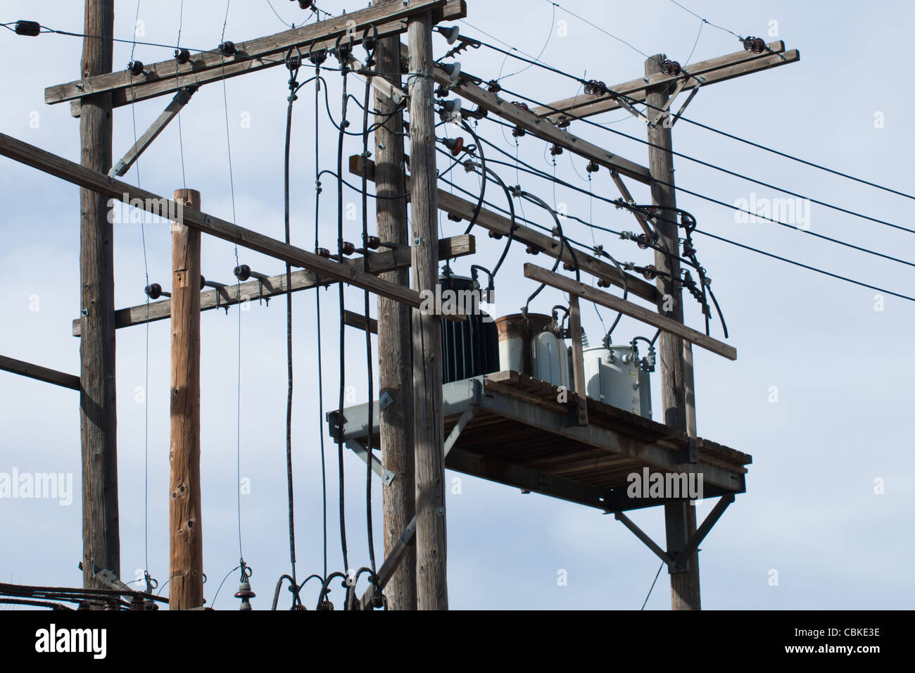 Old wooden electric pole. Stock Photo