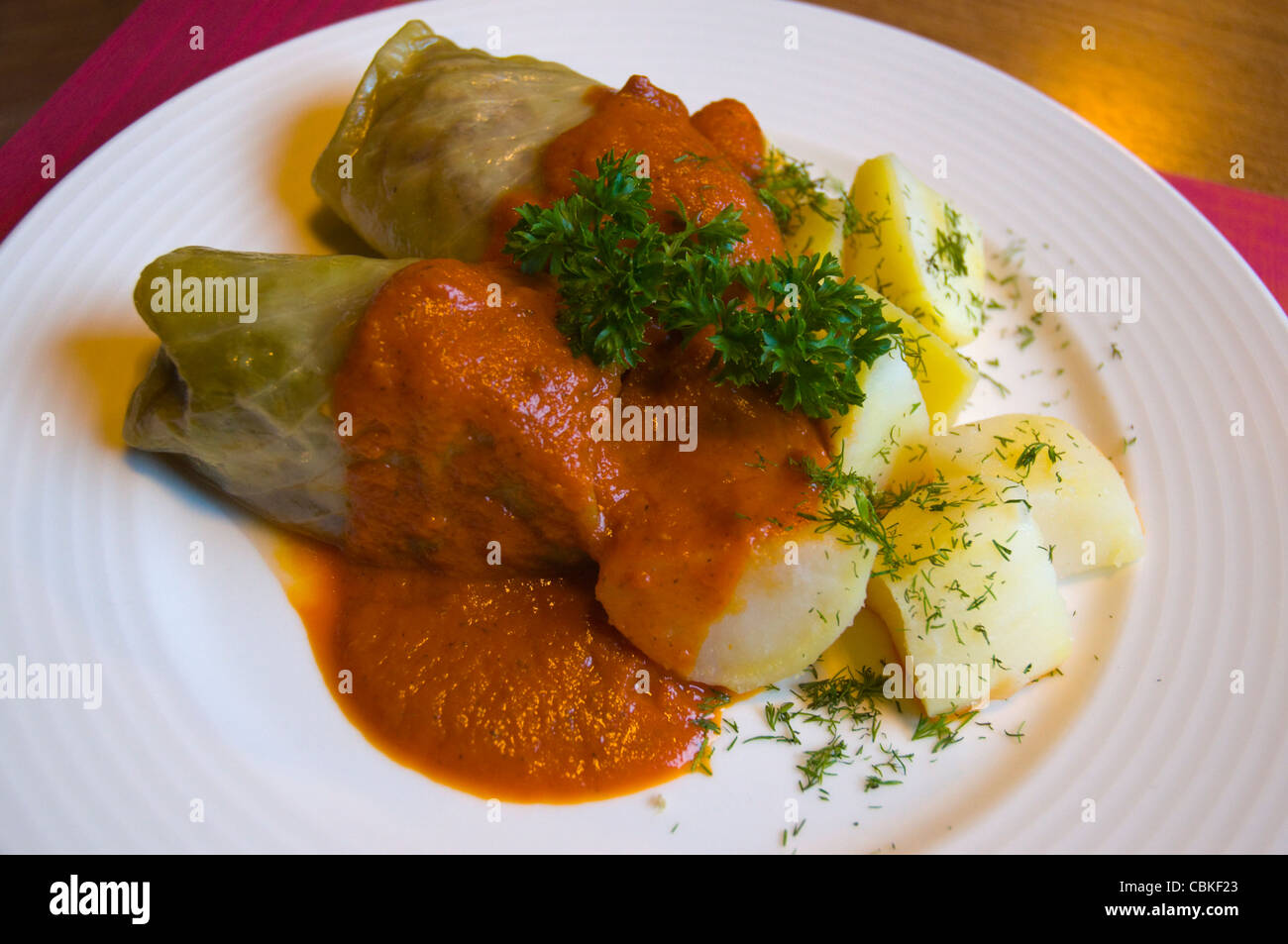 Polish cuisine of Cabbage rolls and boiled potatoes in Tekstylia restaurant old town Gdansk Pomeriania northern Poland Europe Stock Photo
