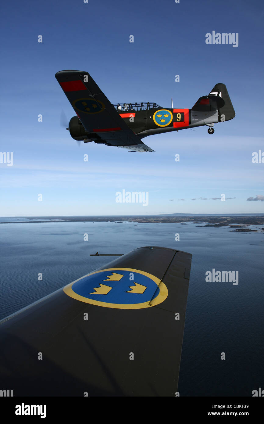 Satenas, Sweden - North American T-6 Texan/Harvard trainer warbirds in Swedish Air Force colors. Stock Photo