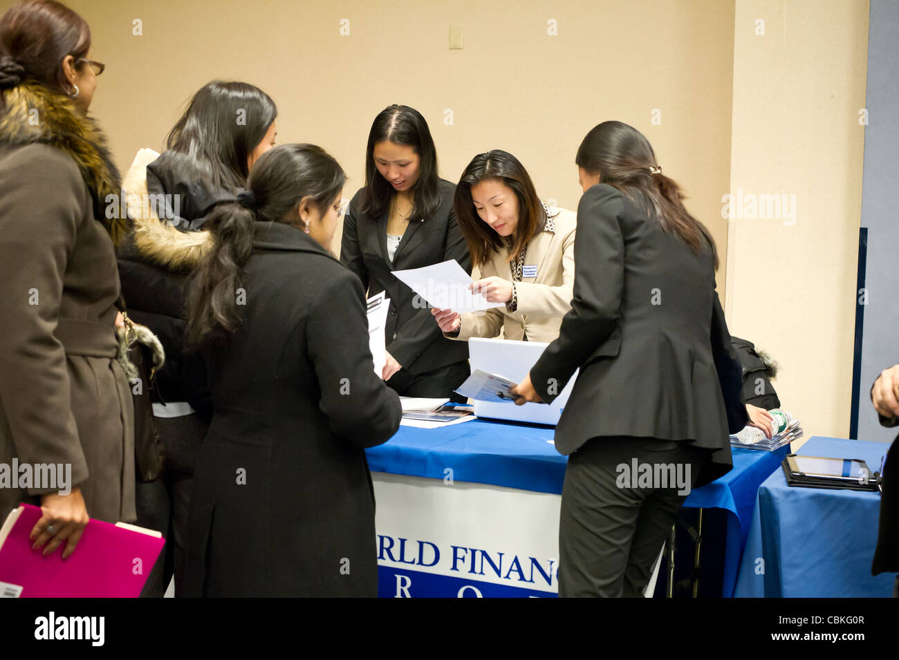 Job seekers attend a job fair in midtown in New York on Monday December 12, 2011. ( © Frances M. Roberts) Stock Photo