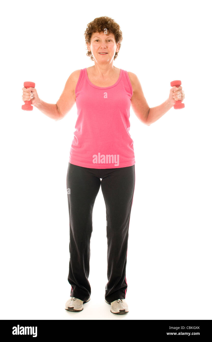 middle age senior woman fitness exercising arm bicep curls strength training with dumbbell