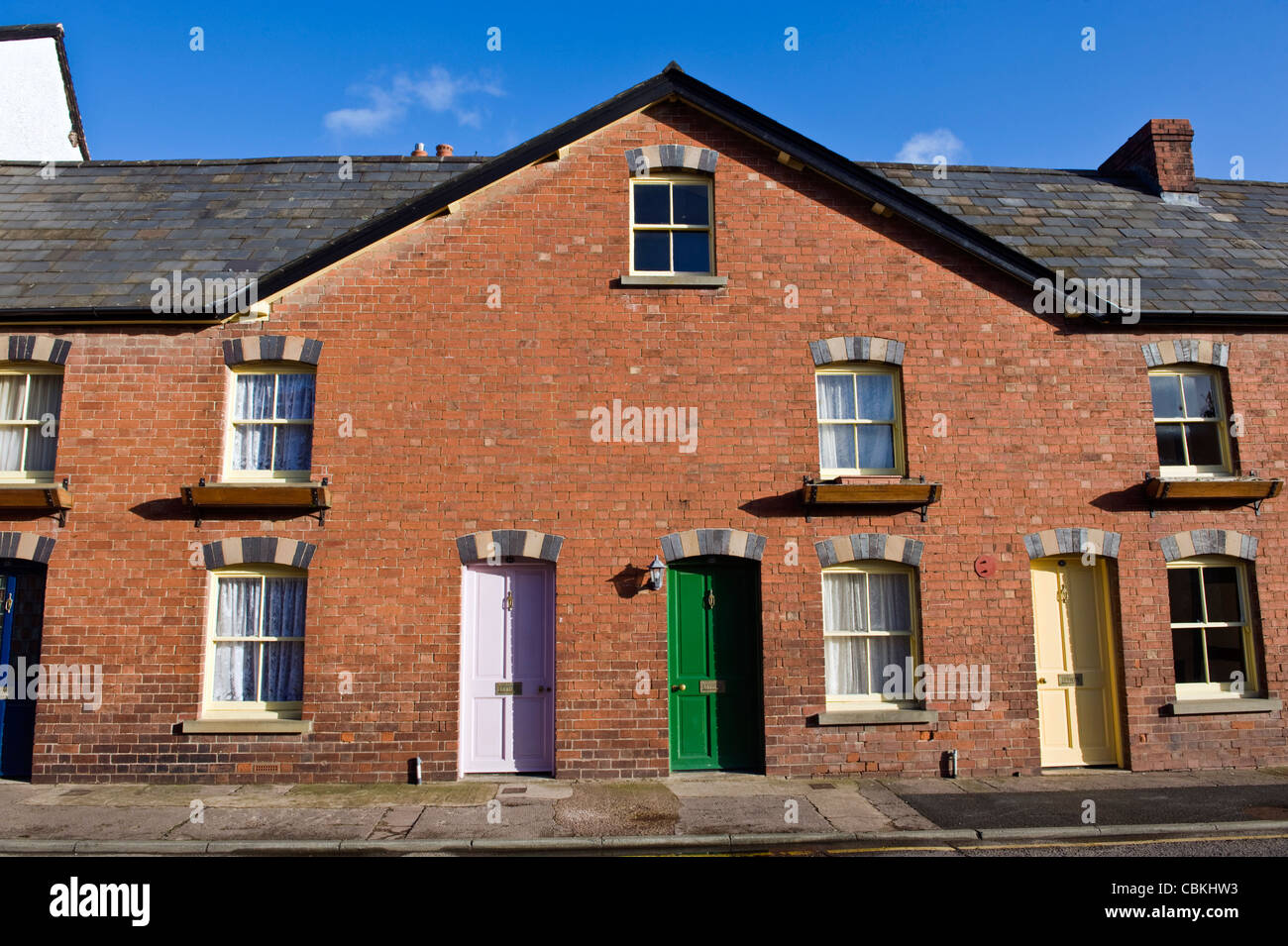 Terrace of red brick period houses with sash windows in Kington