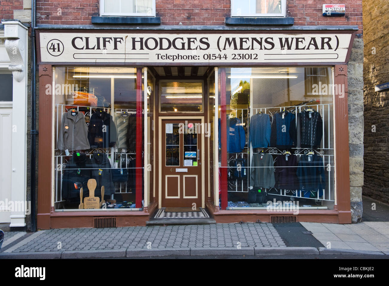 Local Mens Wear shop on high street in Kington Herefordshire England UK