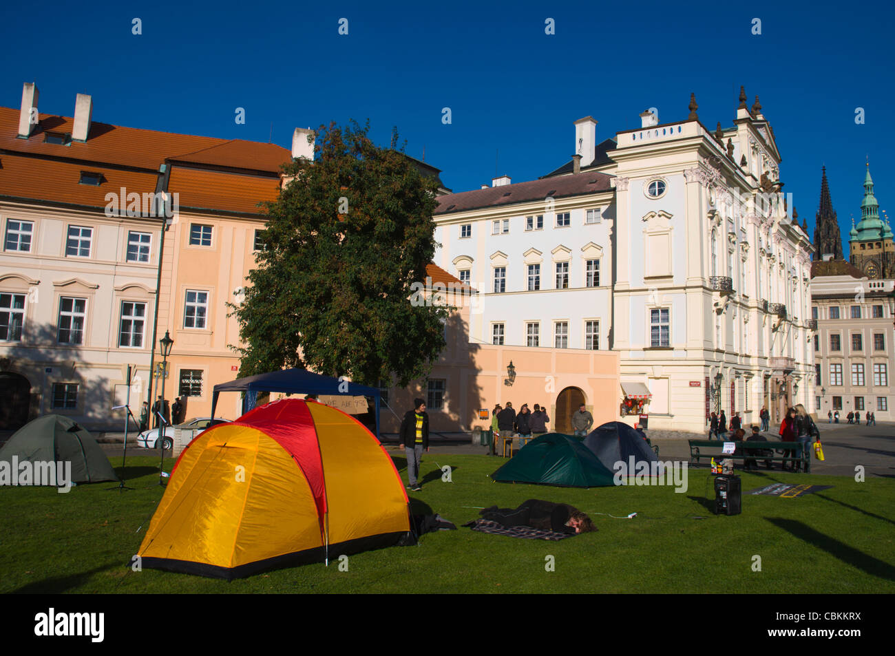 Occupy movement tents Hradcanske namesti square Hradcany castle district Prague Czech Republic Europe Stock Photo