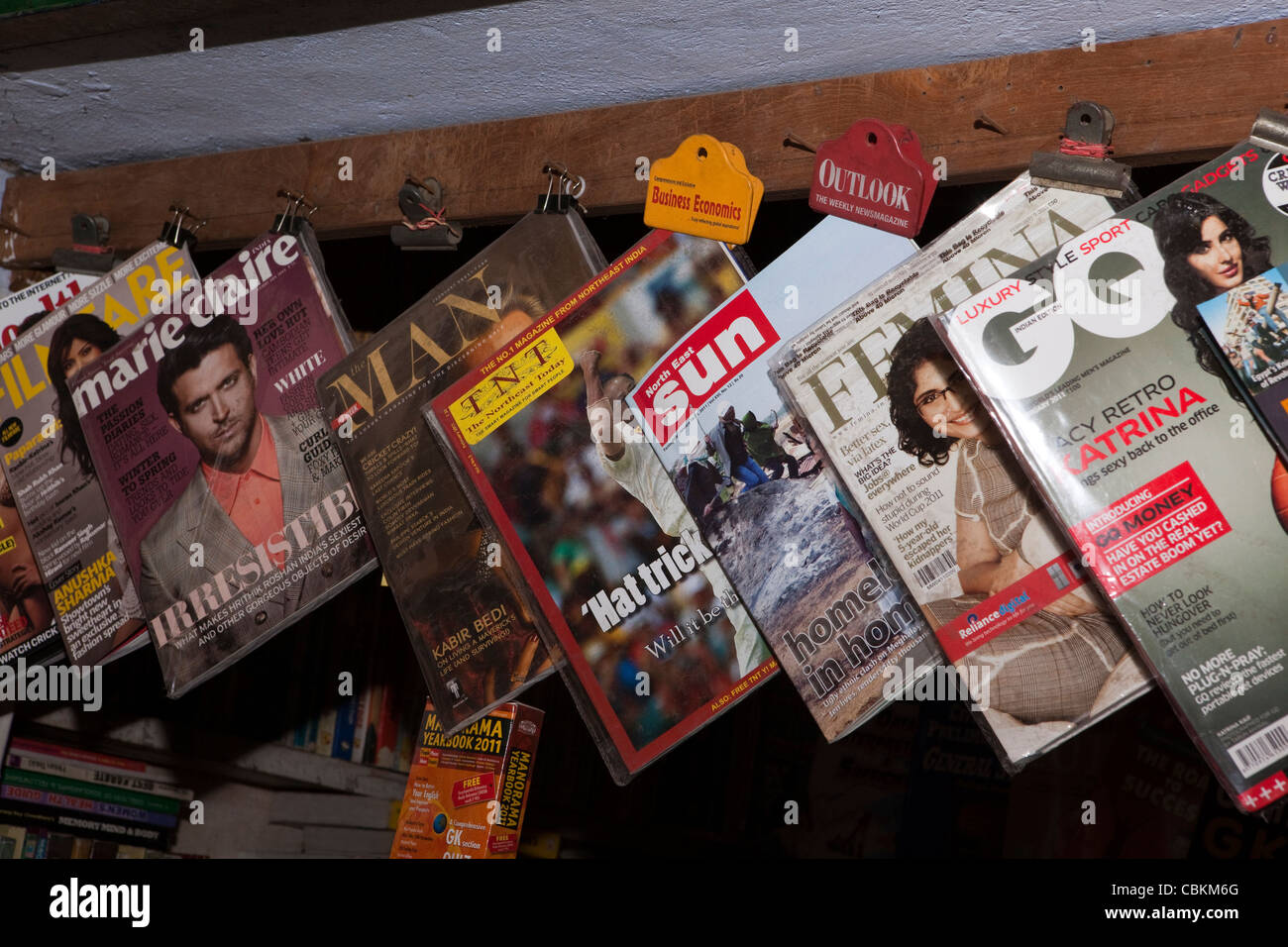 India, Nagaland, Kohima bazaar, magazines for sale at news vendors stall Stock Photo