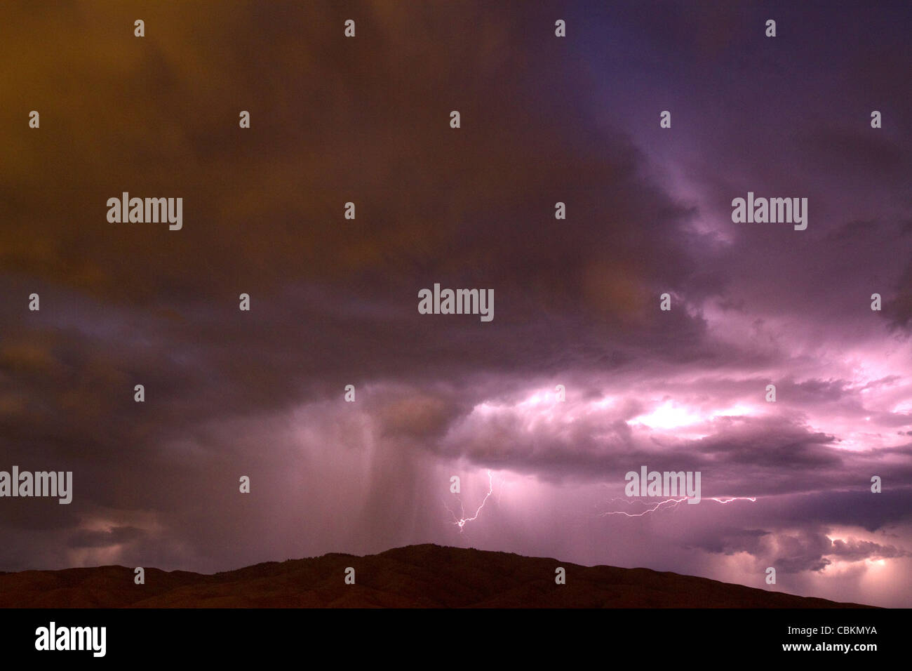 Lightning strikes during a thunderstorm on the first day of summer in Boise, Idaho, USA. Stock Photo