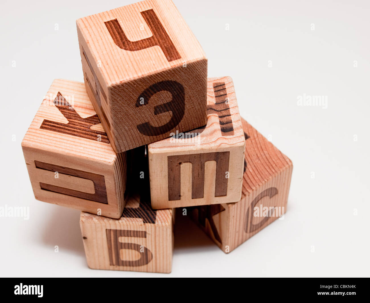Wooden qubes with alphabet. Stock Photo