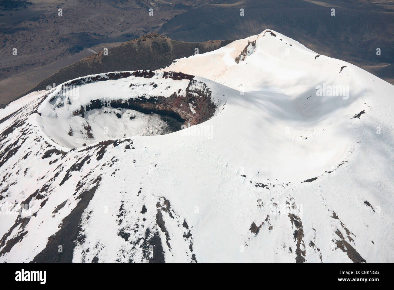 November 2007 - Snow-covered Ngauruhoe cone, Mount Tongariro volcano, New Zealand. Stock Photo