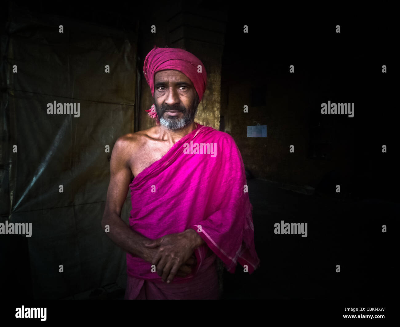 Brahman responsible for the Manikarnika Ghât, the main place of cremation of Varanasi (Benares)., gard of the night and the mem Stock Photo