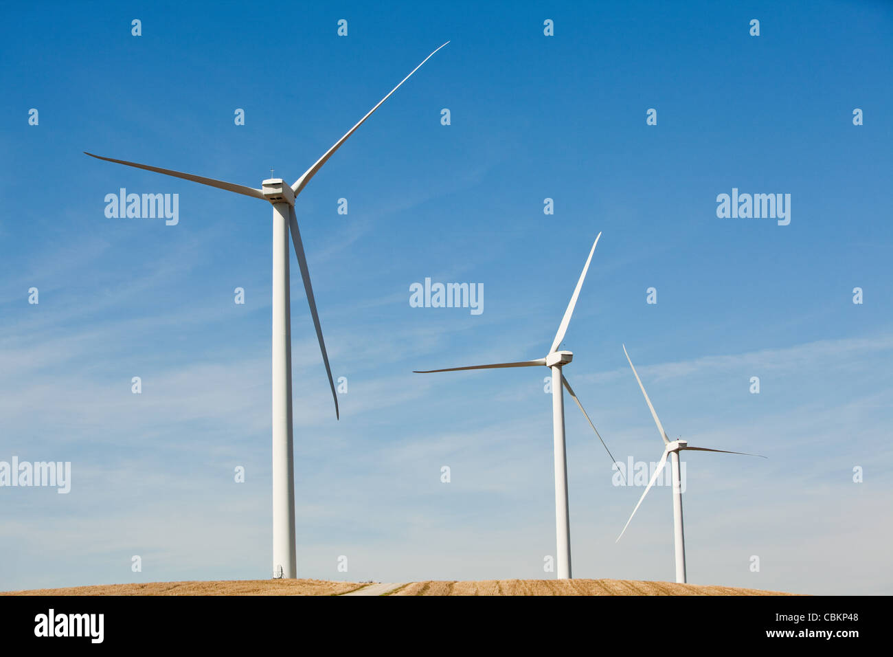 Three wind turbines side by side Stock Photo
