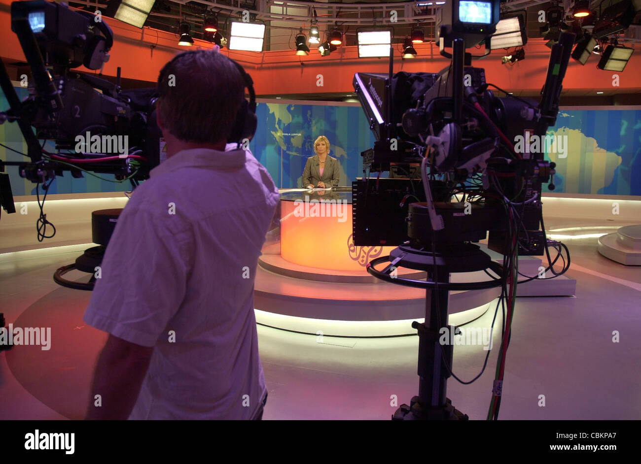 News anchor Jane Dutton delivering the news in the studios of Al