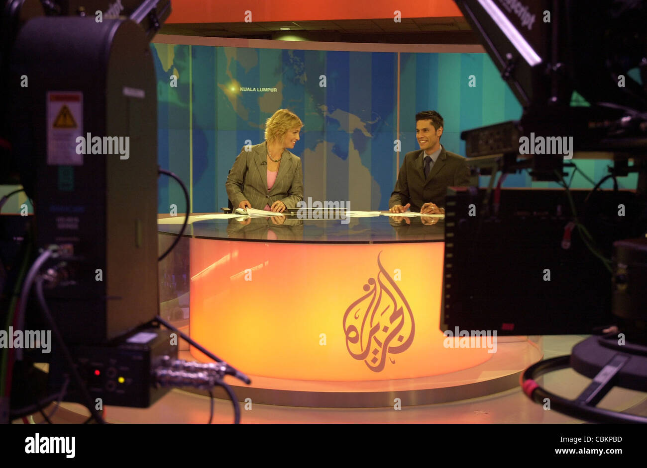 News anchor Jane Dutton delivering the news in the studios of Al