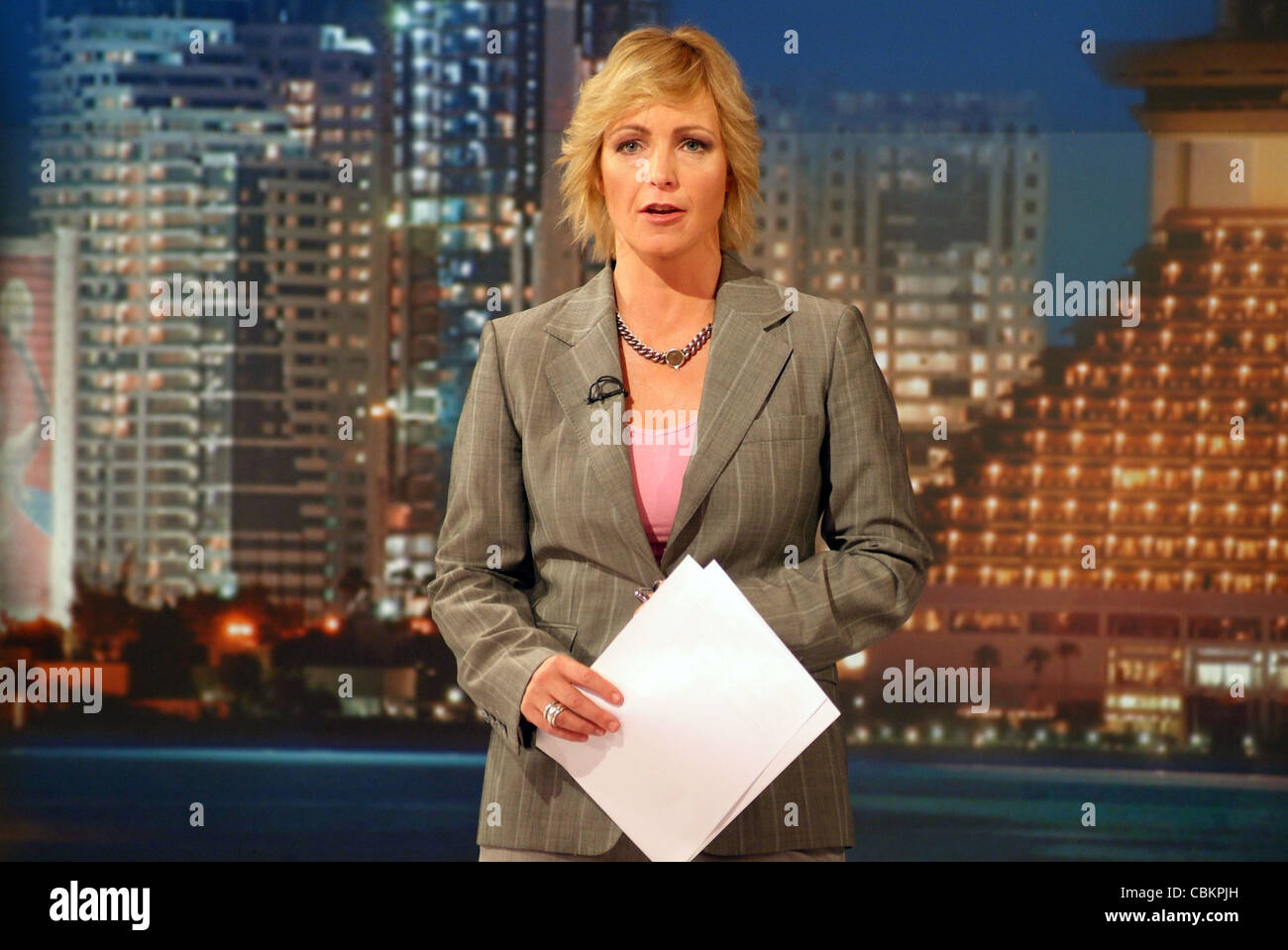 News anchor Jane Dutton delivering the news in the studios of Al