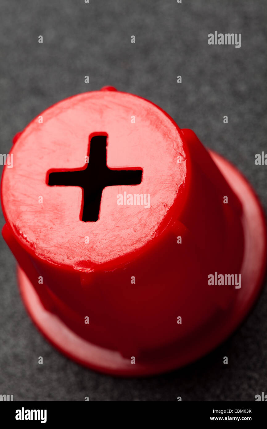 Battery Red positive close up Stock Photo