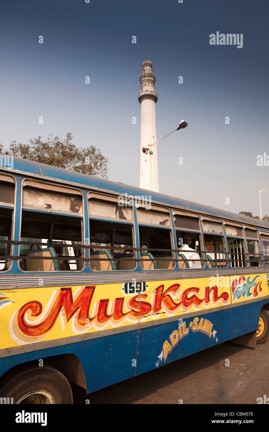 India, West Bengal, Kolkata, Esplanade, Sahid Minar, historic, colonial era obelisk above long distance bus stand Stock Photo