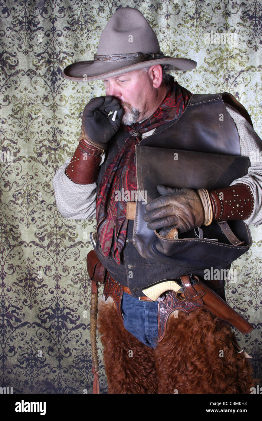 A vintage cowboy smoking Stock Photo