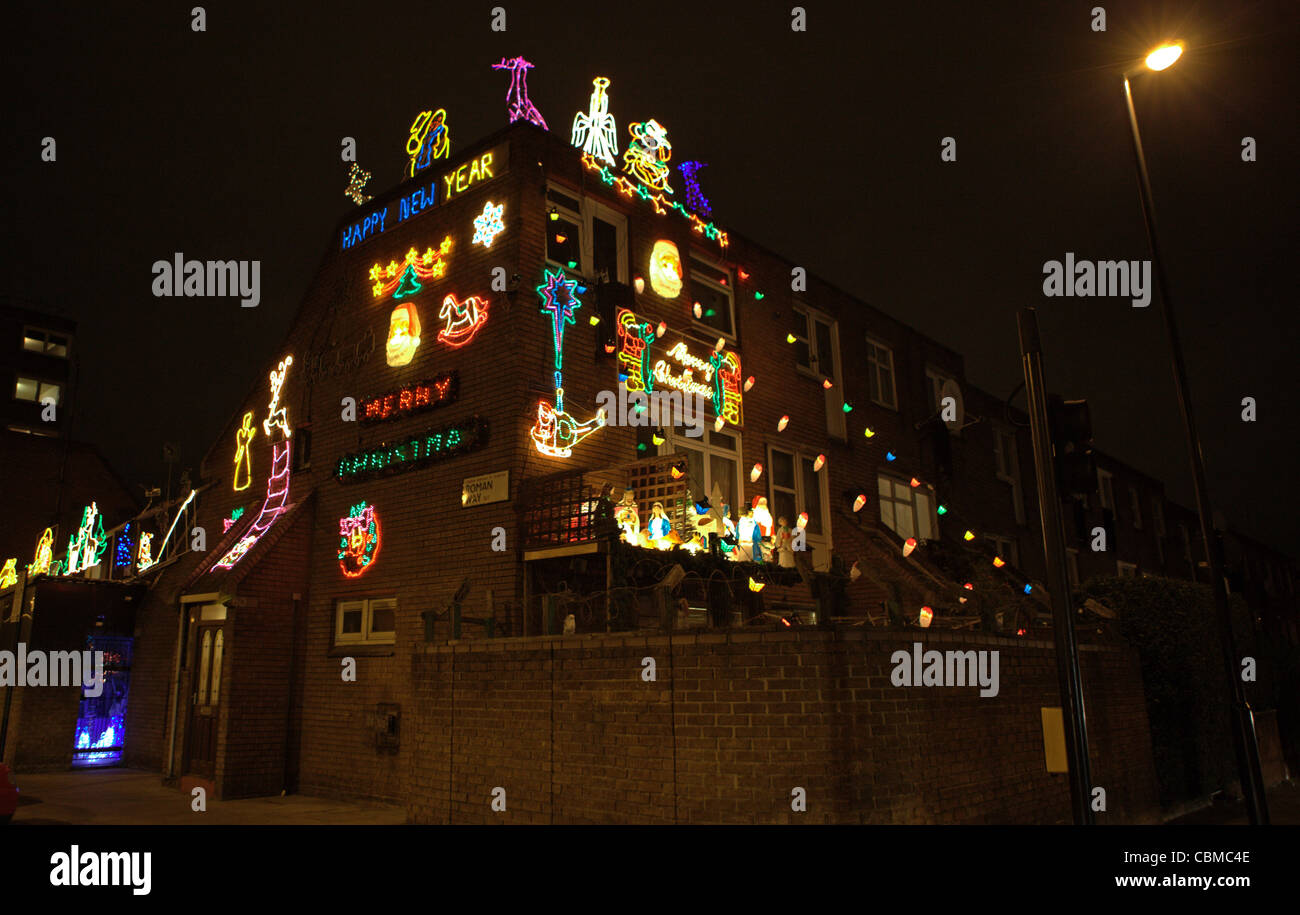 Christmas lights and decorations on a house at the corner of Roman Way and Mackenzie Road in Islington, North London, UK Stock Photo