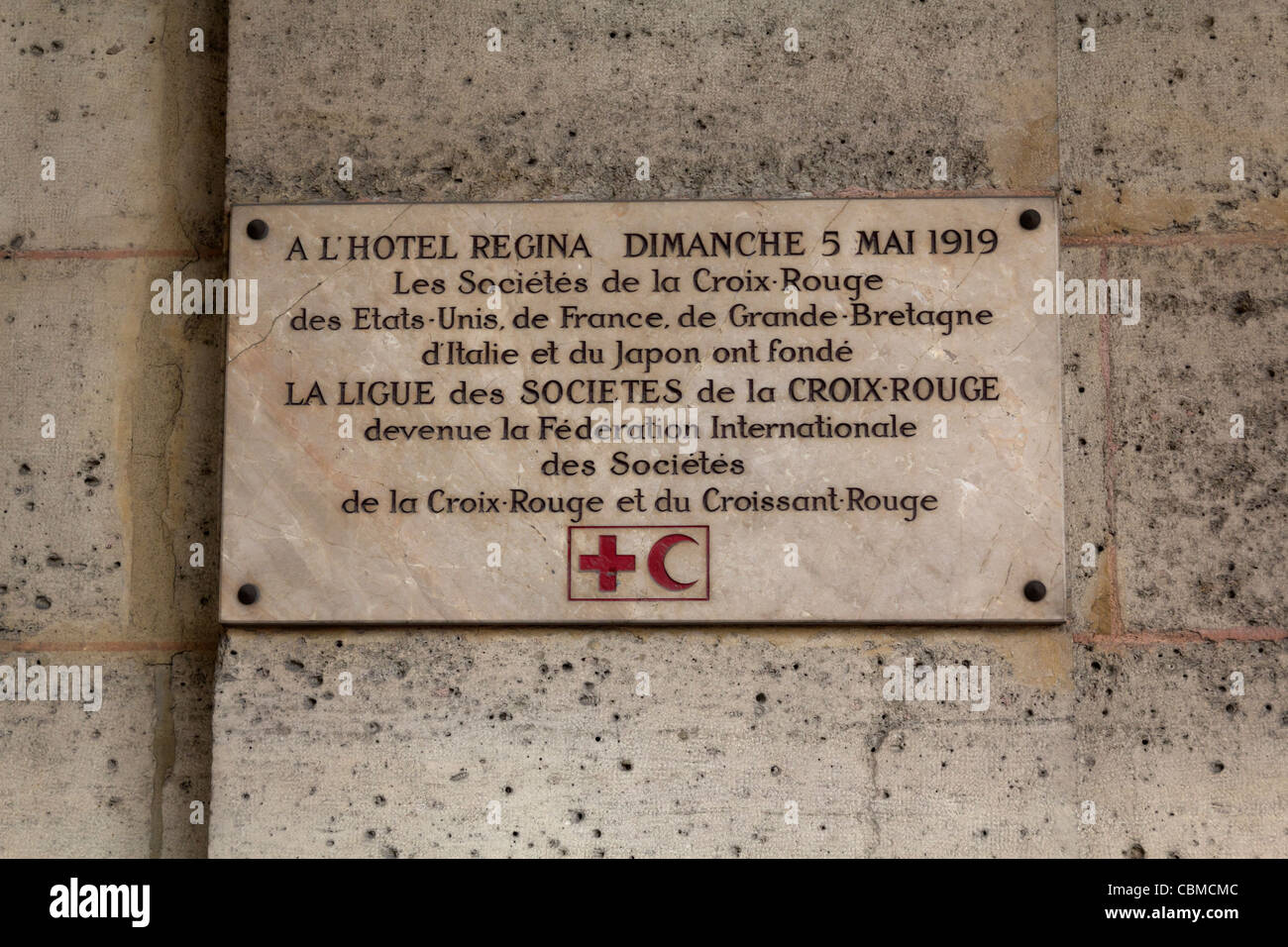 Red Cross historical plaque at Hotel Regina, Paris, France Stock Photo