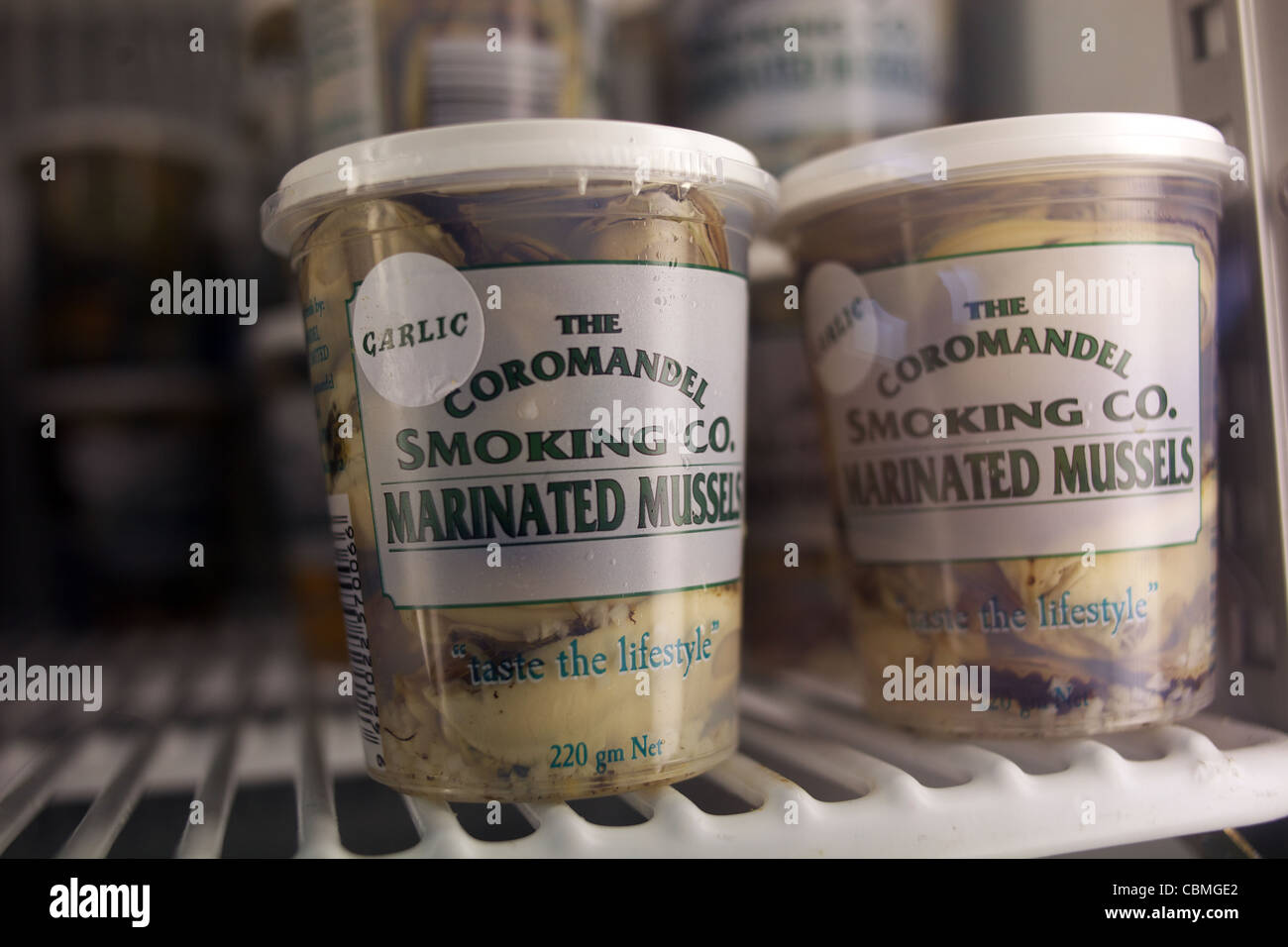 Smoked mussels for sale at The Coromandel Smoking Company, Coromandel Town. North Island, New