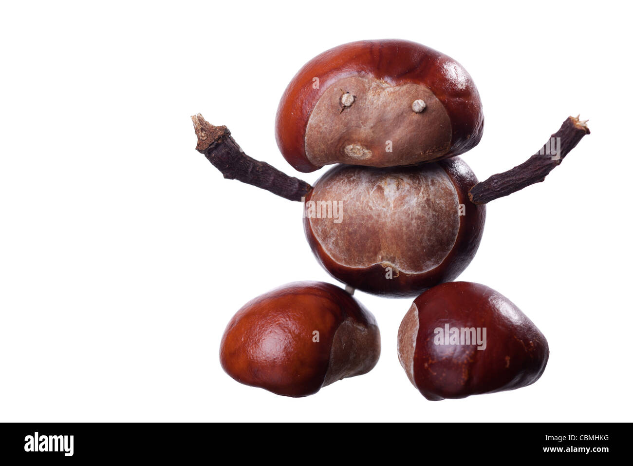 Little manikin made of chestnuts Stock Photo