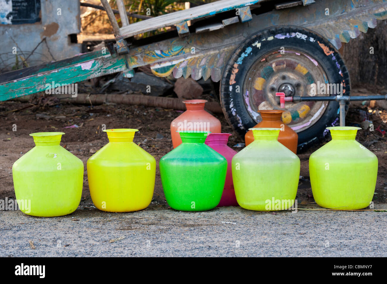 Colourful plastic indian water carrying pots in an indian street. Andhra Pradesh, India Stock Photo