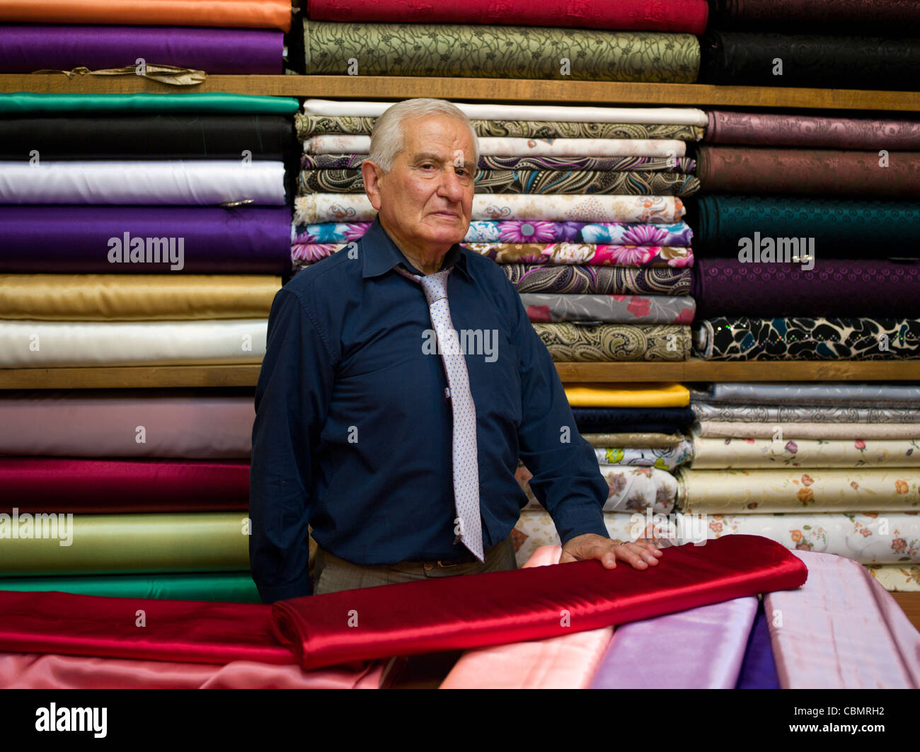 Mercer selling fabric in The Grand Bazaar, Istanbul a covered market ...