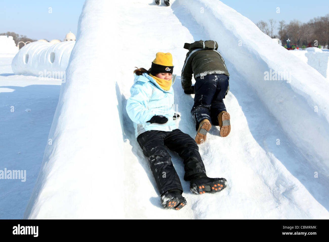Children ice sliding, Harbin ice festival Stock Photo Alamy