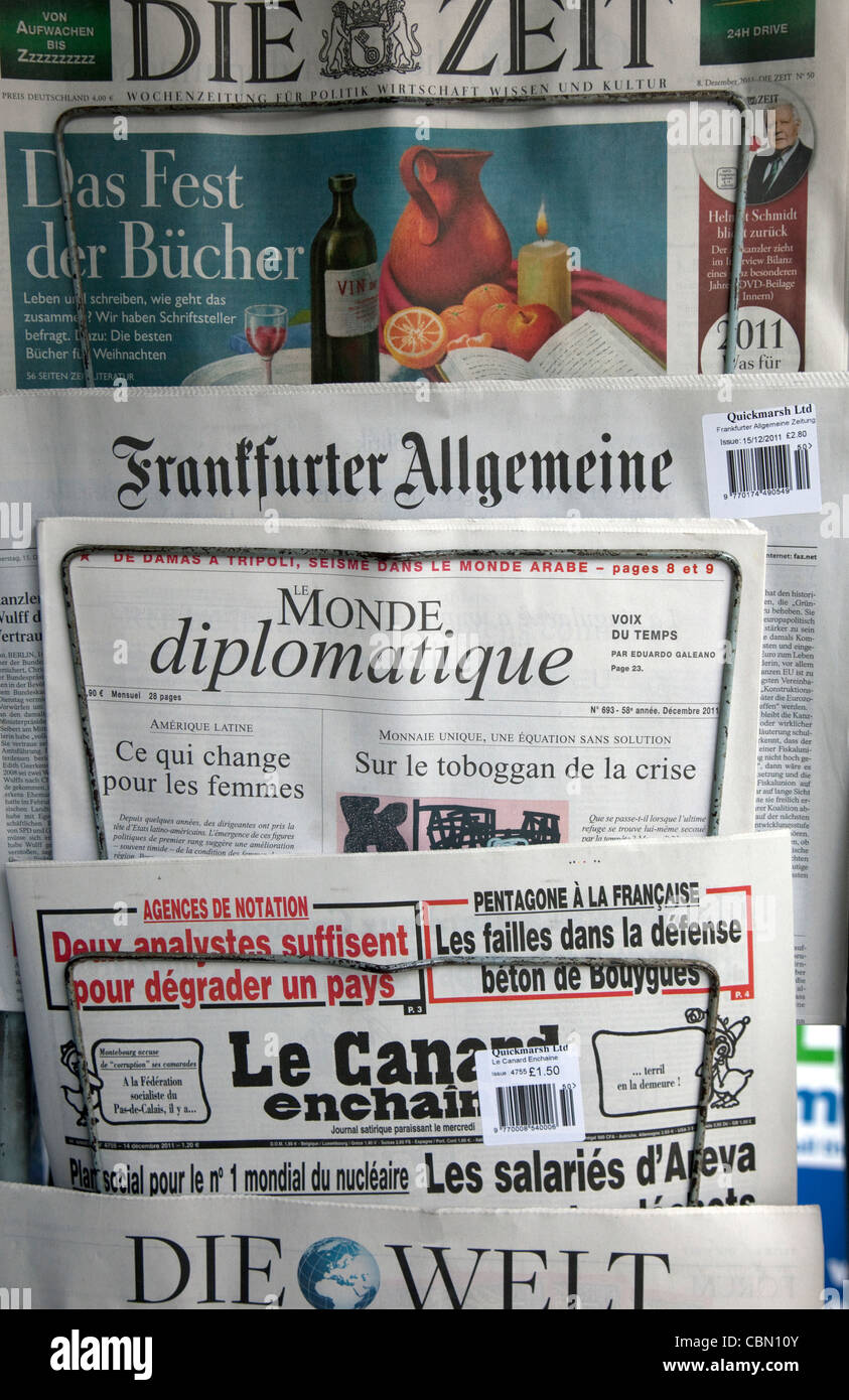 German and French newspapers on sale in London Stock Photo