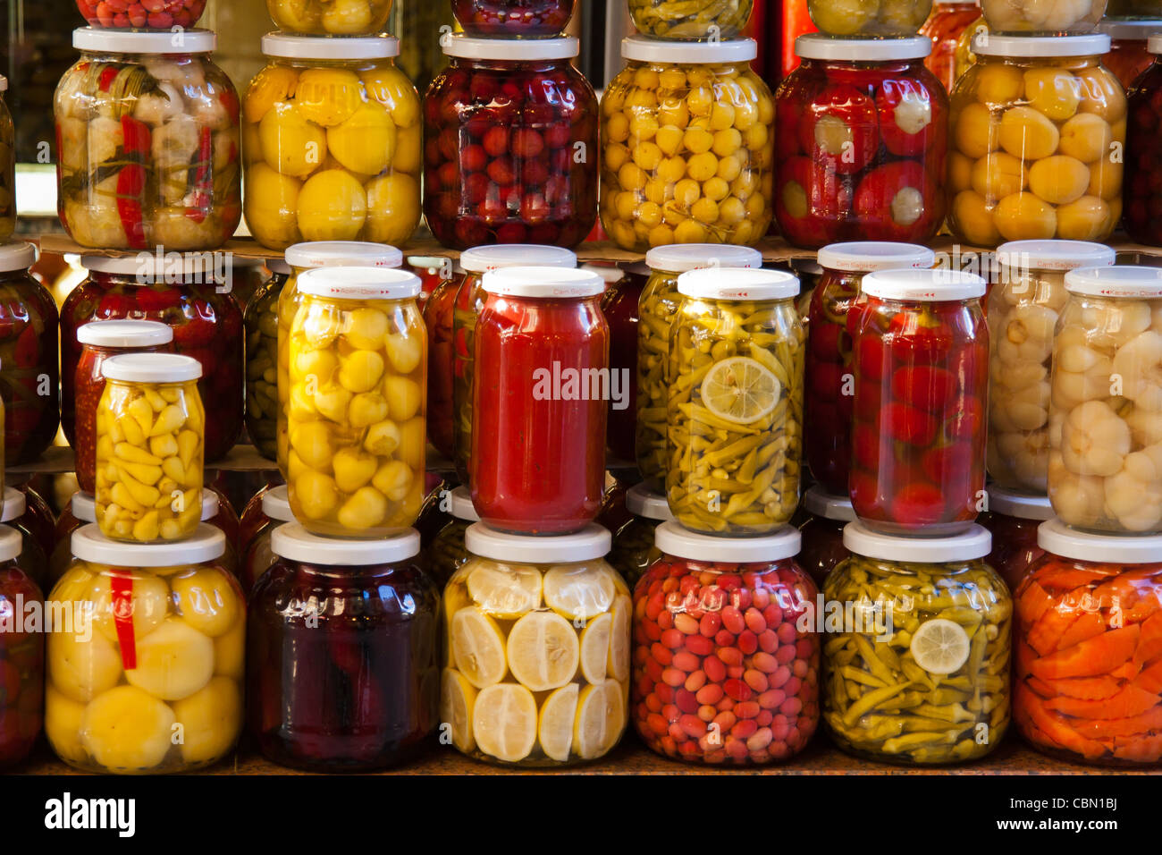 Rows of jars of pickled vegetables for sale Stock Photo Alamy