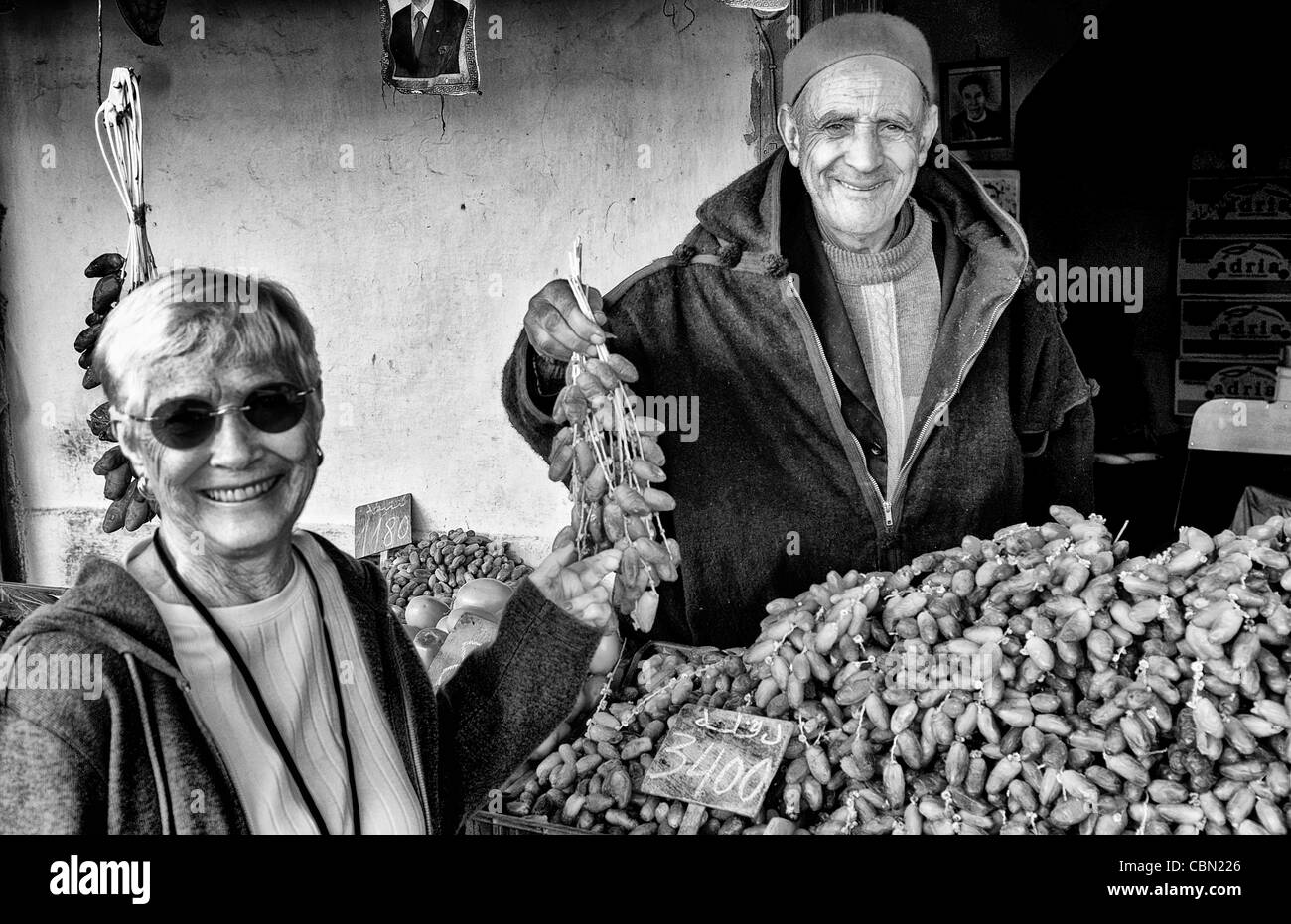 Testour in Tunisia Africa portrait of old Muslim man selling dates to tourist Stock Photo