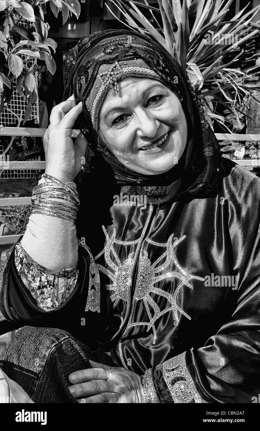 Portrait of Muslim woman with spider dress in Medina shopping area of Sousse Tunisa Africa Stock Photo