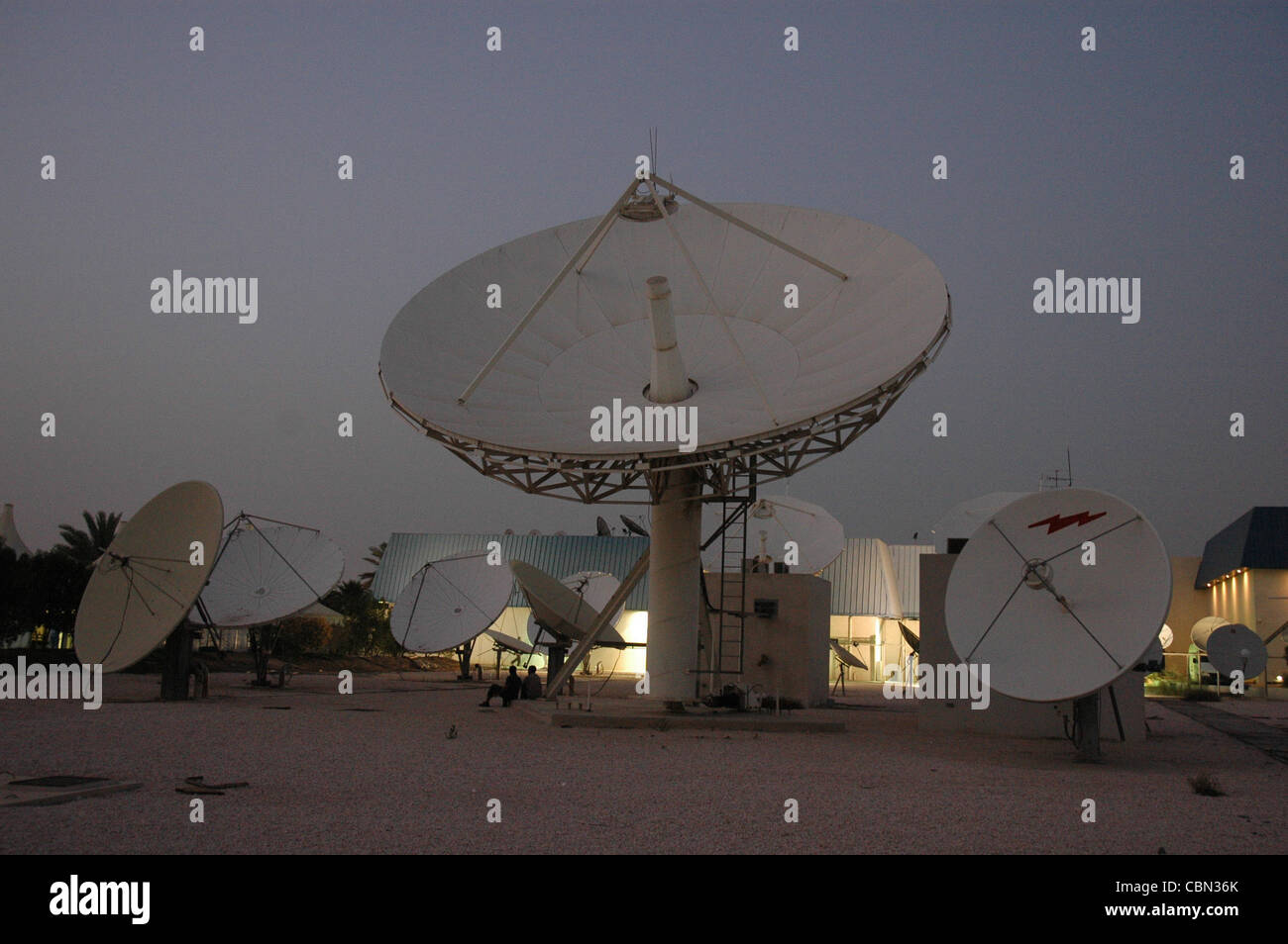 Satellite dishes beam programming from the Qatar based Al Jazeera