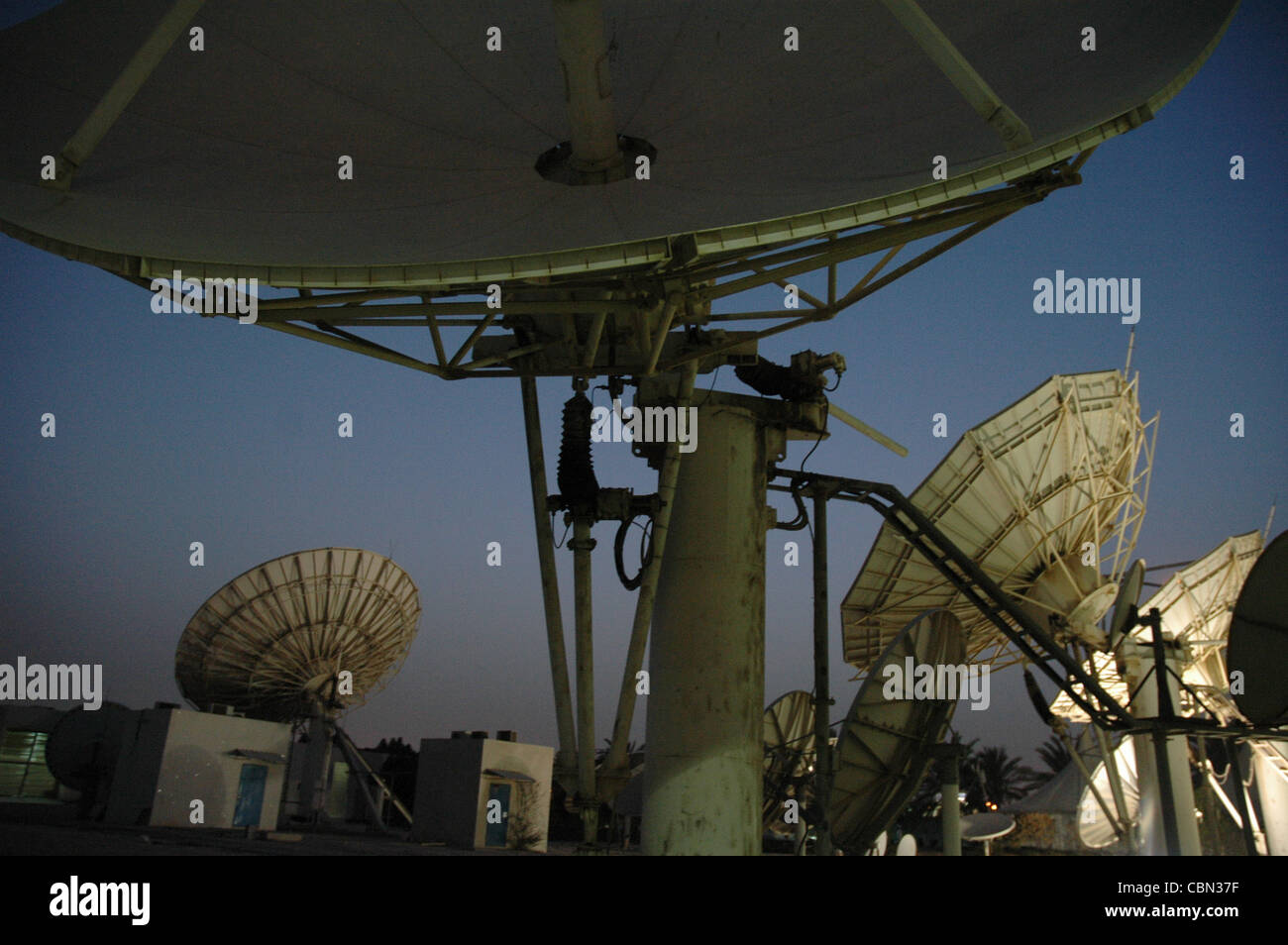 Satellite dishes beam programming from the Qatar based Al Jazeera Satellite  Channel around the world Stock Photo - Alamy