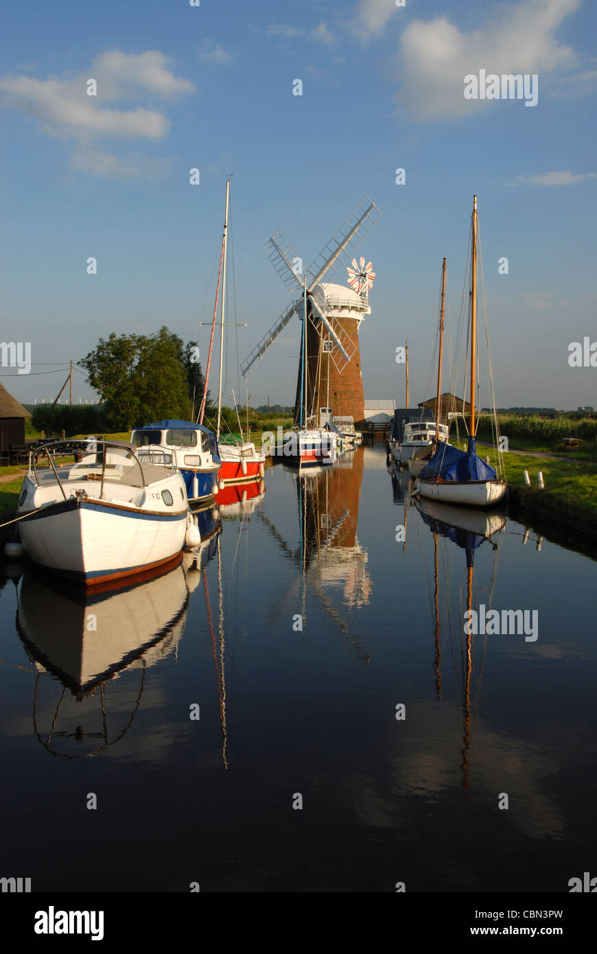 Horsey Mill, a drainage mill on the Norfolk Broads in vertical format ...