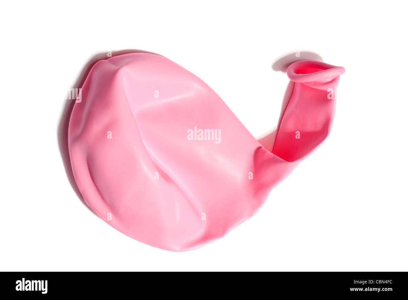 A deflated pink balloon Stock Photo