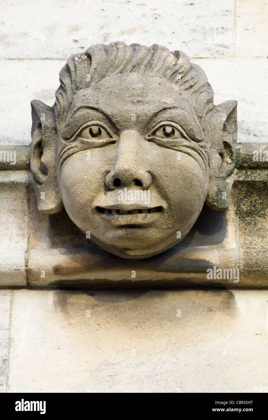 Gargoyles and Exotics of Magdalen College, Oxford - happy face Stock Photo