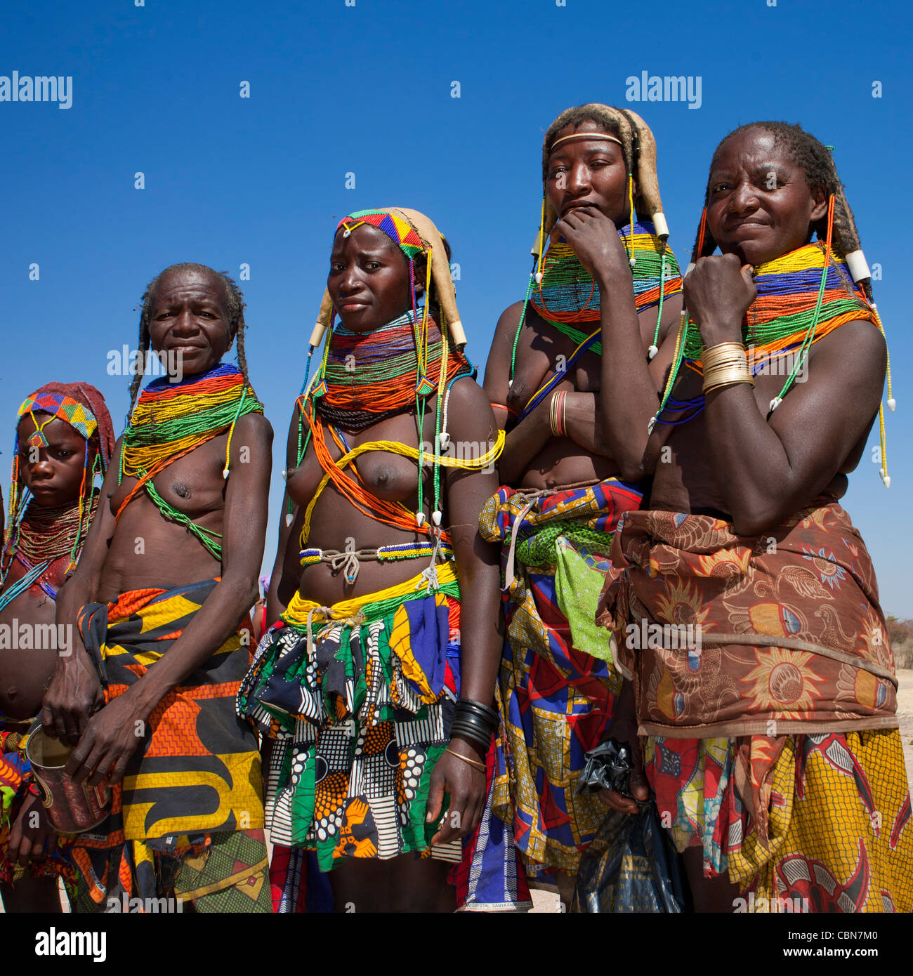 Group Of Mumuhuila Women, Hale Village, Angola Stock Photo