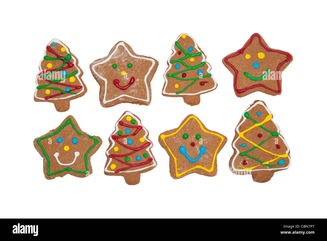 Delightful Christmas tree and star shaped colorful gingerbread cookies on white Stock Photo