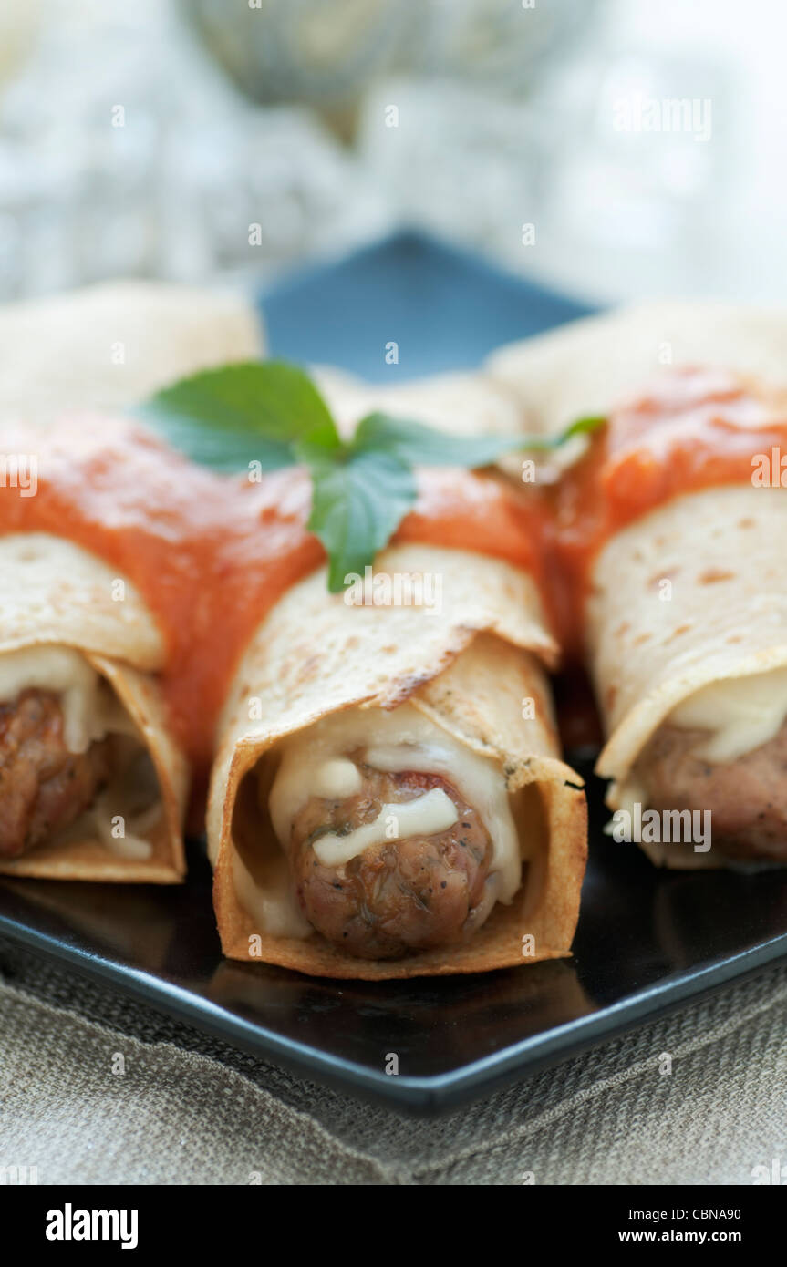 Sausage Filled Crepes Stock Photo Alamy