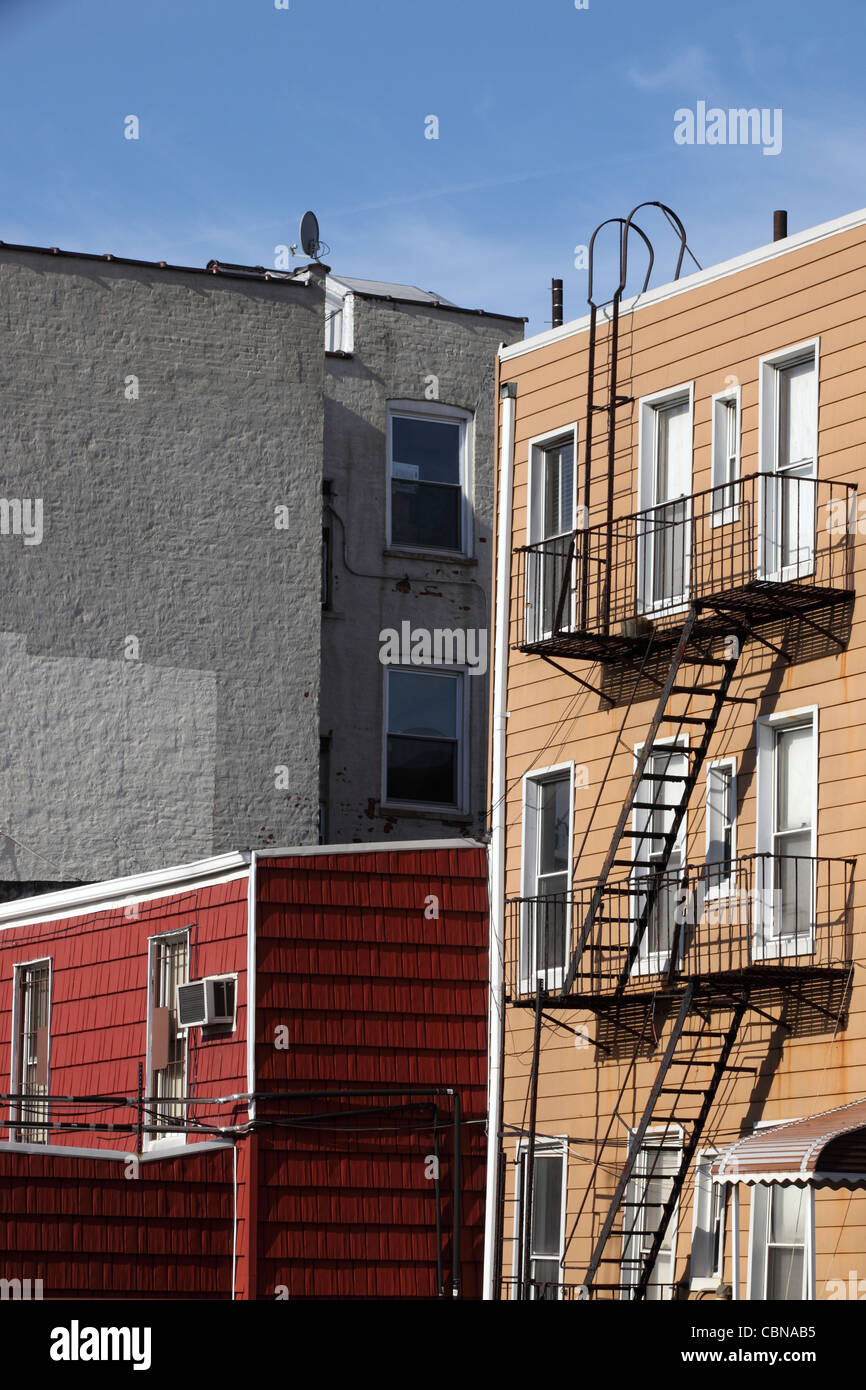 Brightly colored wooden clad fascia facade apartment buildings