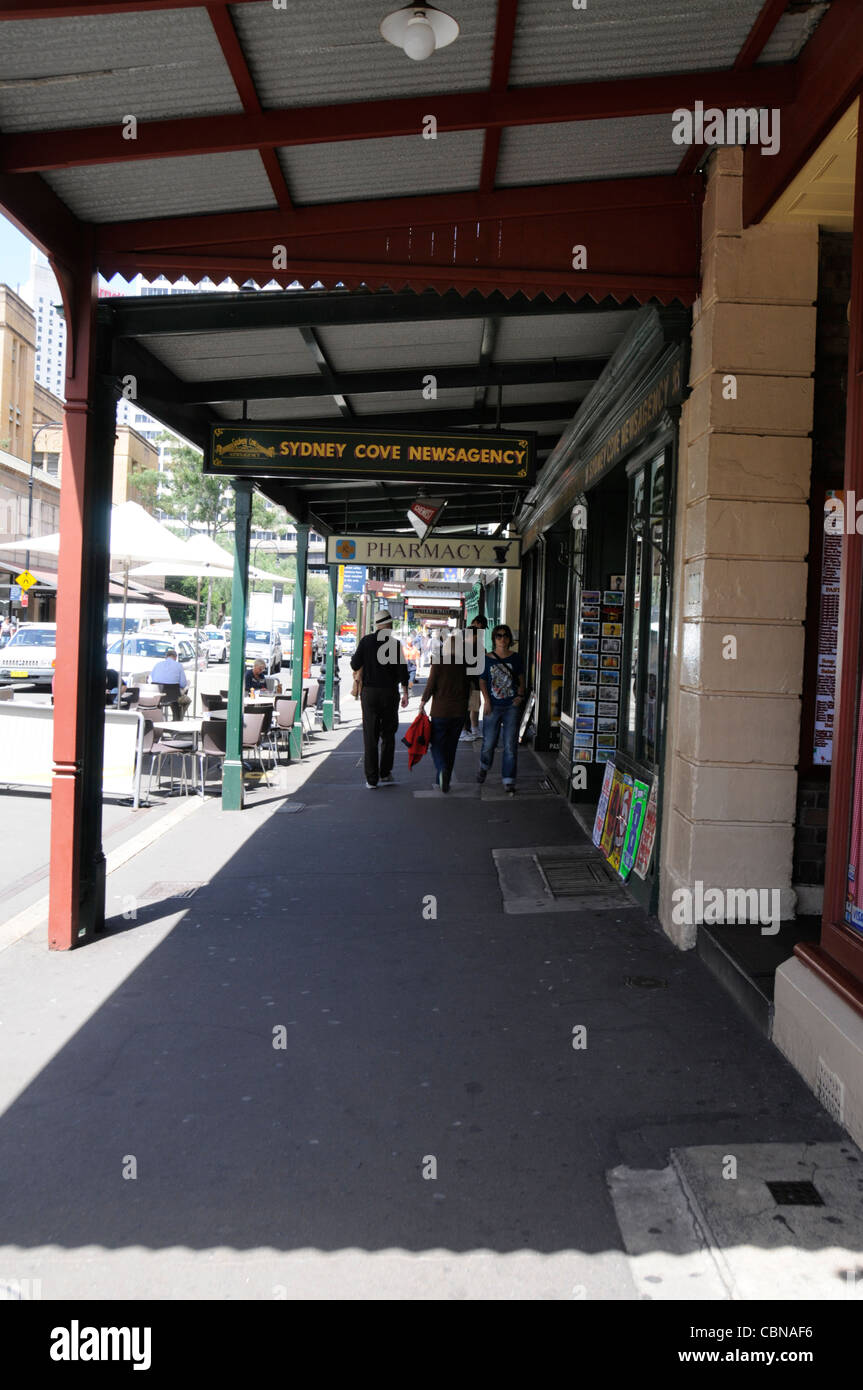 A row of Victorian small shops with its veranda in George Street in The Rocks, a historic suburb of Sydney in New South Wales, Australia. Stock Photo