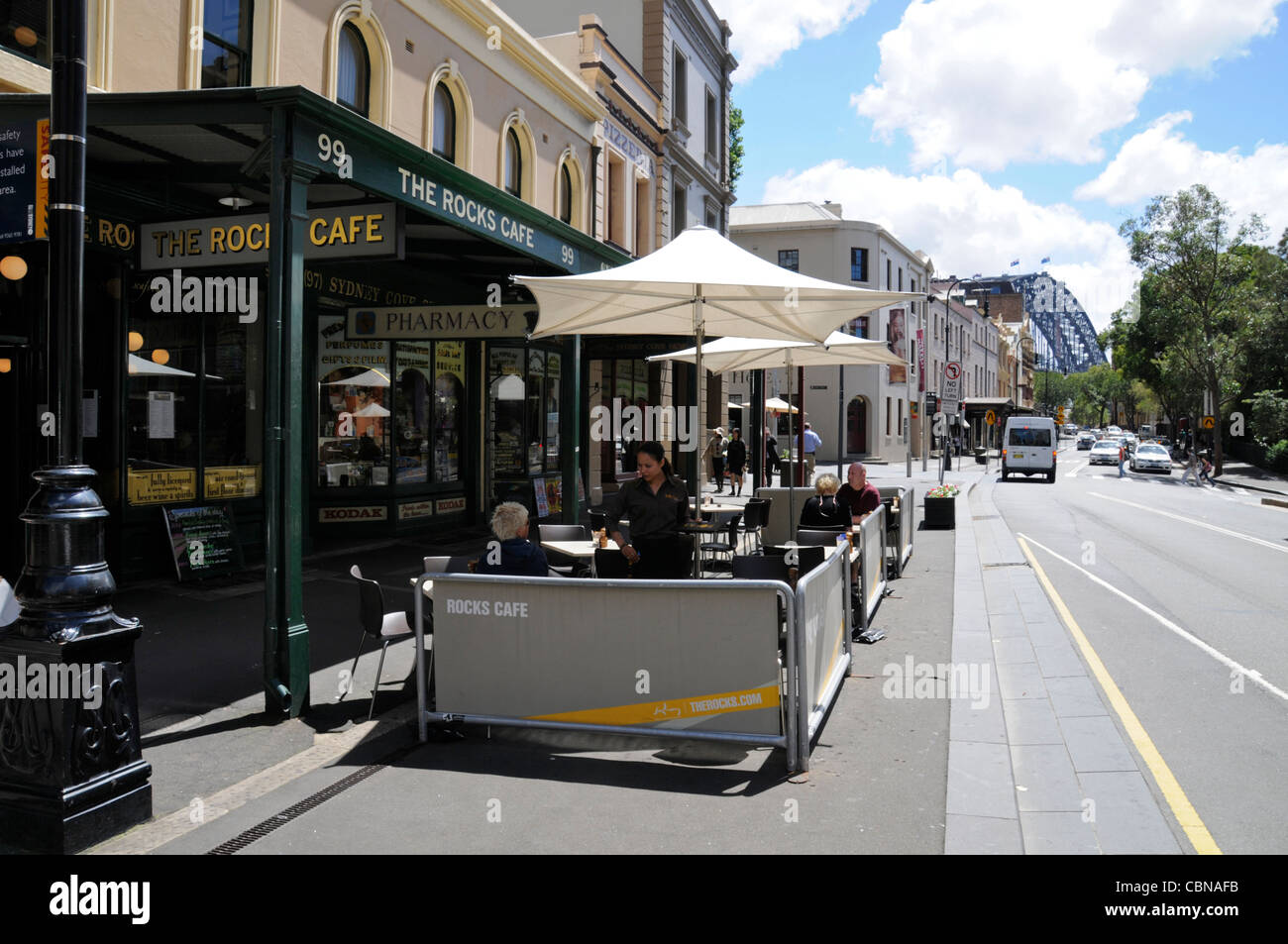 A row of small shops and eateries on George Street in The Rocks, a historic suburb of Sydney in New South Wales, Australia Stock Photo