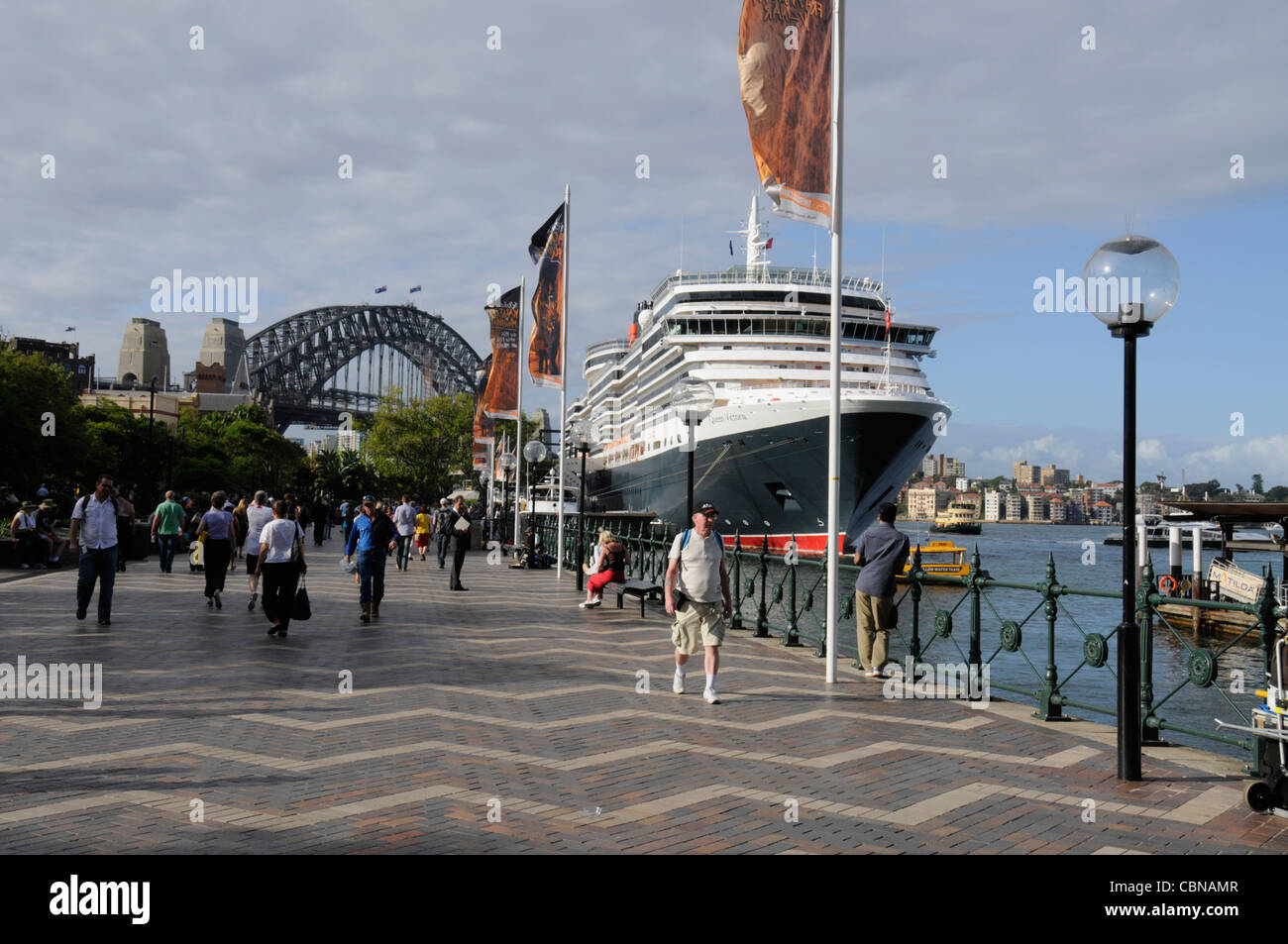 The Cunard cruise ship, Queen Victoria docks in Circular Quay with the