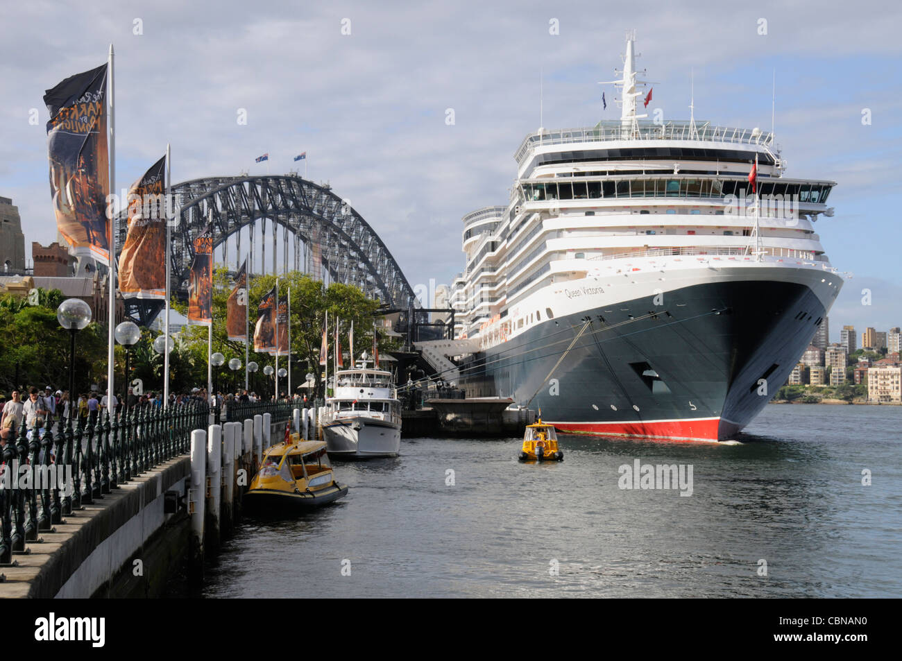 The Cunard cruise ship, Queen Victoria docks in Circular Quay with the