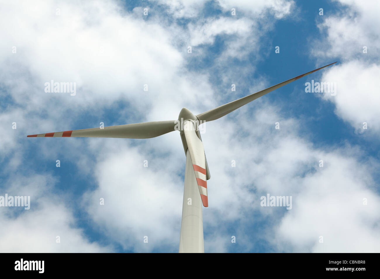 Wind turbine on blue sky Stock Photo - Alamy