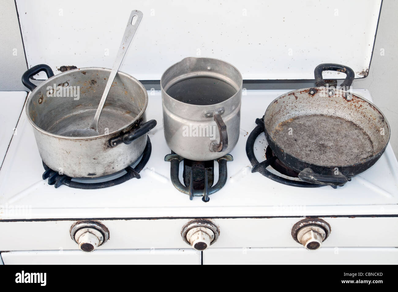 vintage cooker with old pots Stock Photo - Alamy