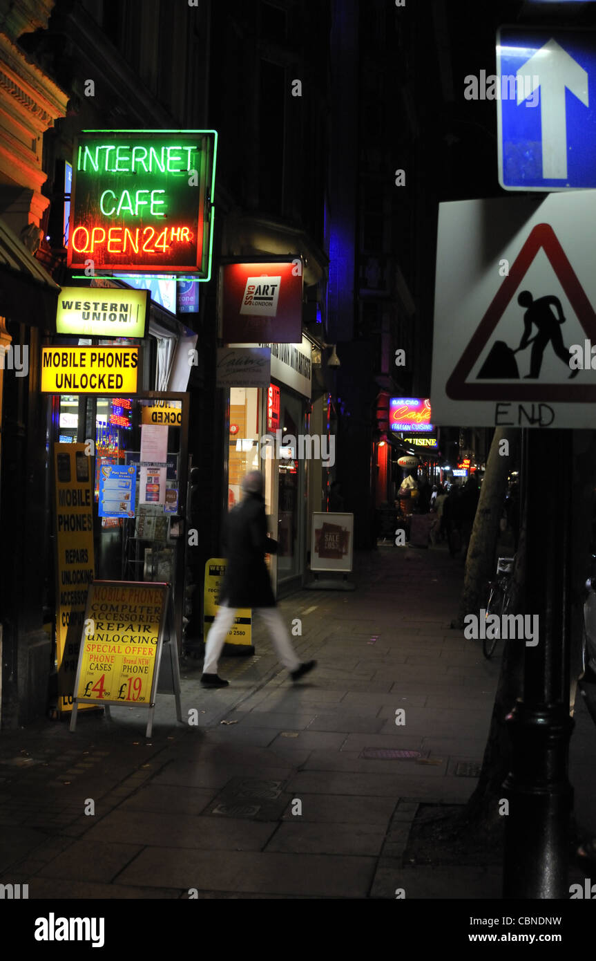 'Internet cafe' and 'Open 24 hours' neon signs , Westend, London. Stock Photo