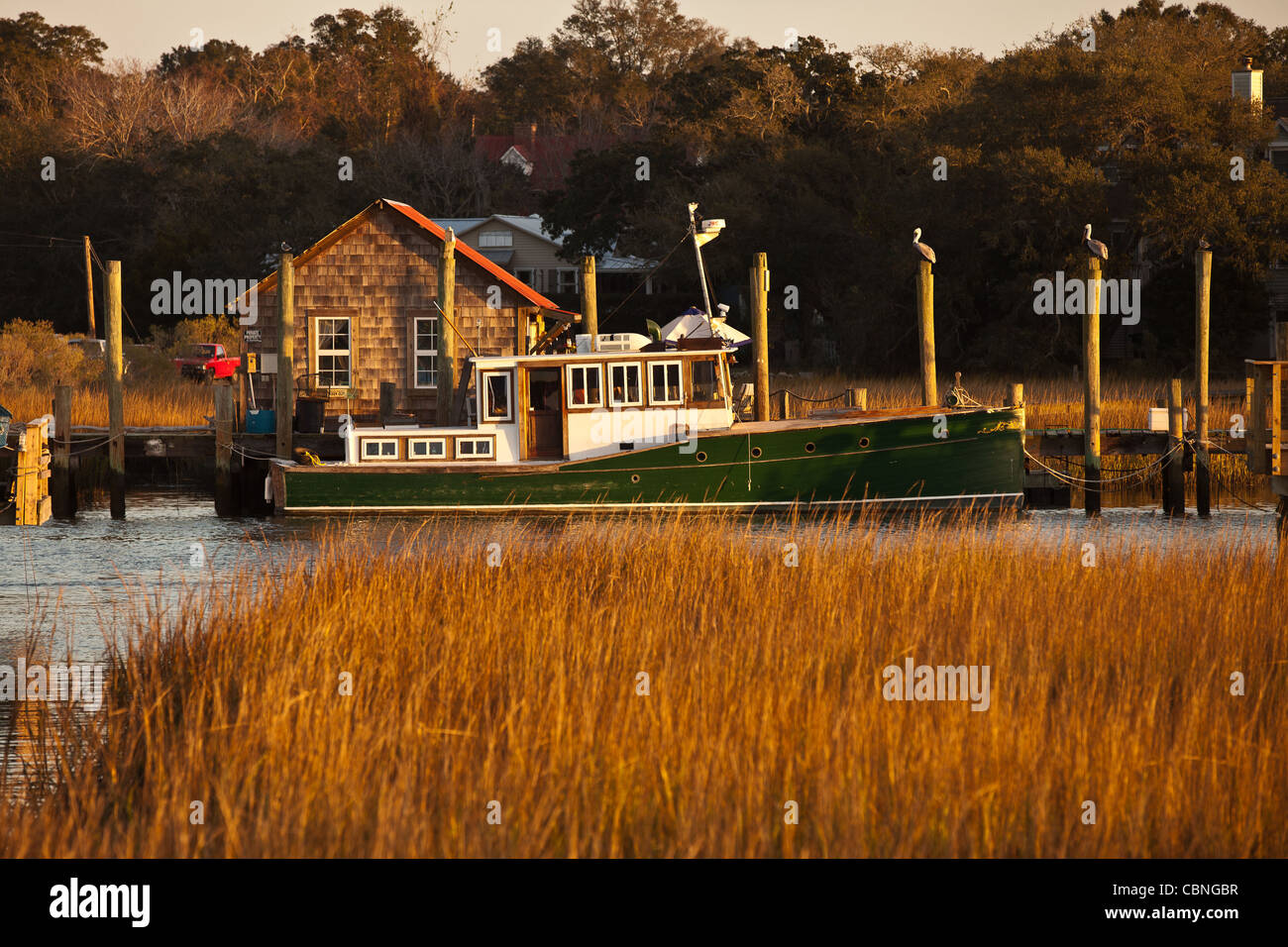 A fishing boat docked in Shem Creek, Mt Pleasant, SC across the harbor
